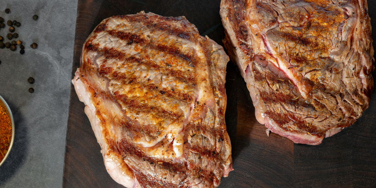 Bison Ribeye Steak with Garlic Herb Butter and Roasted Brussels Sprout ...